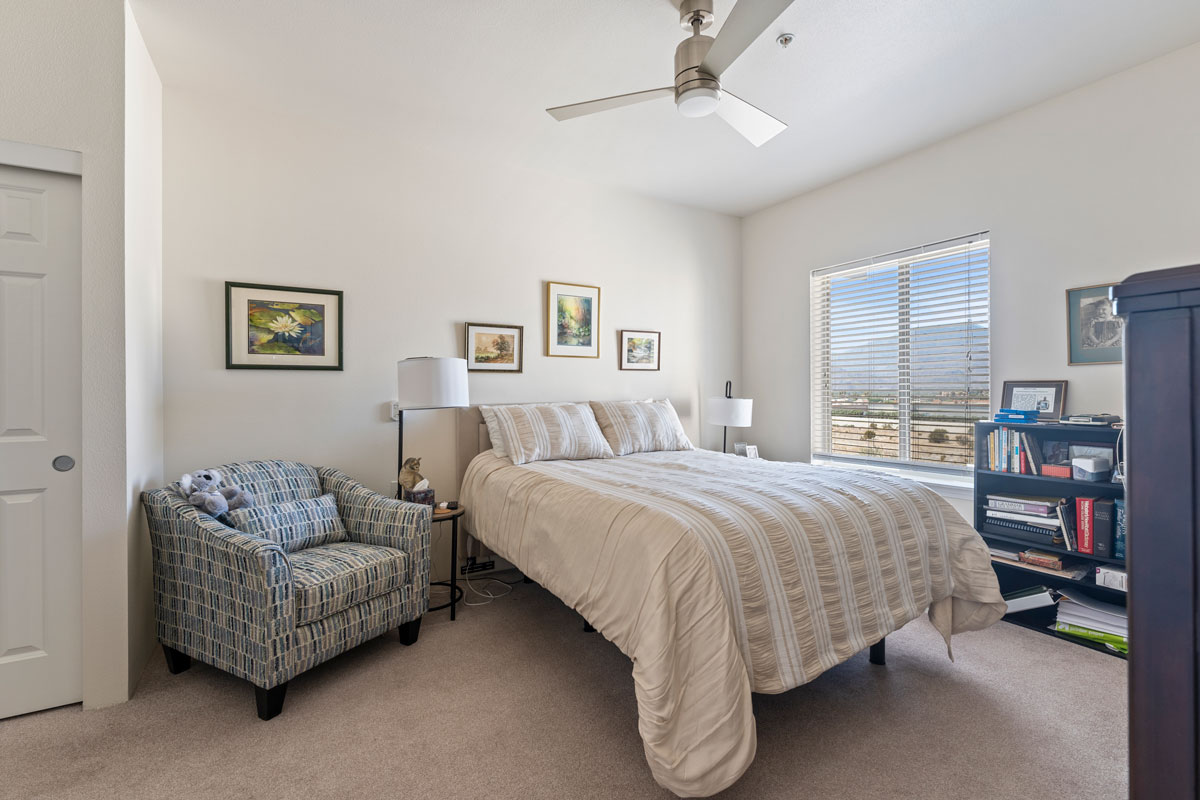 A furnished bedroom in a Glenmoore apartment